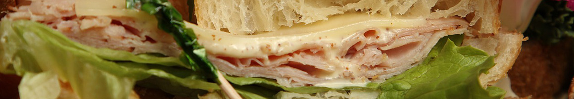 Eating Sandwich at Sandwich Man restaurant in Ventura, CA.
